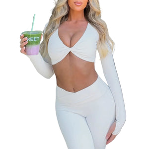 Women's white long sleeve yoga set with zipper detail