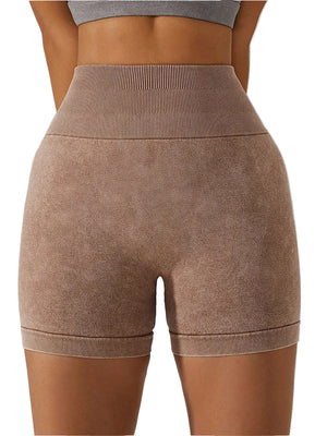 Women's breathable hip-lifting fitness shorts in light coffee, modern grey, and wild green colors