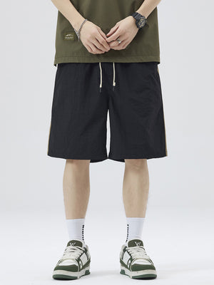 Men's quick-dry casual shorts with side ribbon stripes in black and khaki