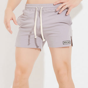 Men's three-point slit sports cotton shorts in charcoal gray, black, light gray, and white colors