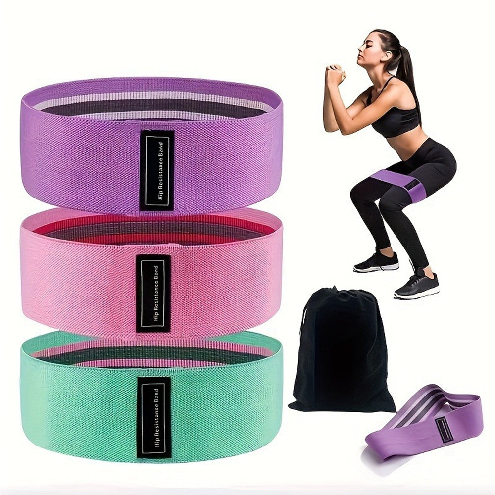 Set of 3 resistance loop bands in green, pink, and purple with carrying bag