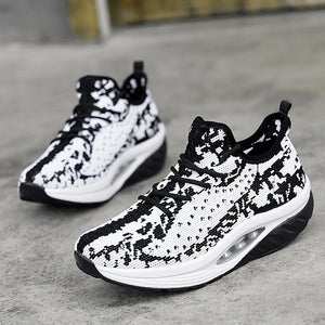 Women's breathable flyknit athleisure shoes in multiple colors with rubber sole and air cushion