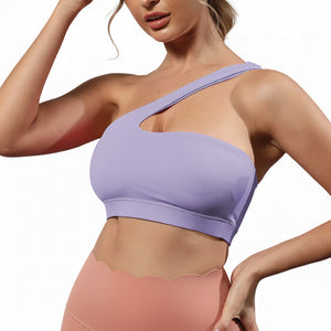 One-shoulder bare-feel sports bra in various colors with medium cup and halter neck straps