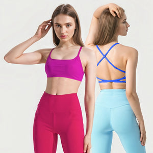 Women's cross back padded sports bra with removable pads in multiple colors