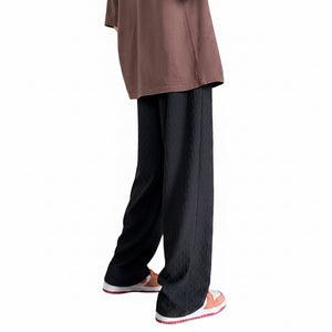 Jacquard rhombus patterned men's draped pants in white, gray, and black colors